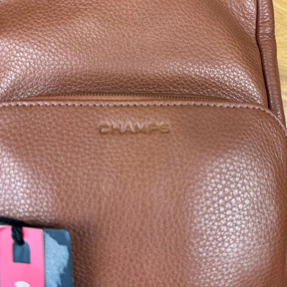 Champs NWT Onyx Brown leather sling Bag w adjustable Strap and Minimalist Design